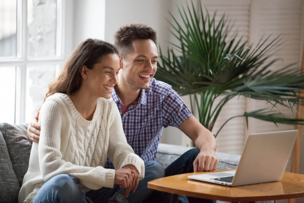 Couple engaging in online couples counseling